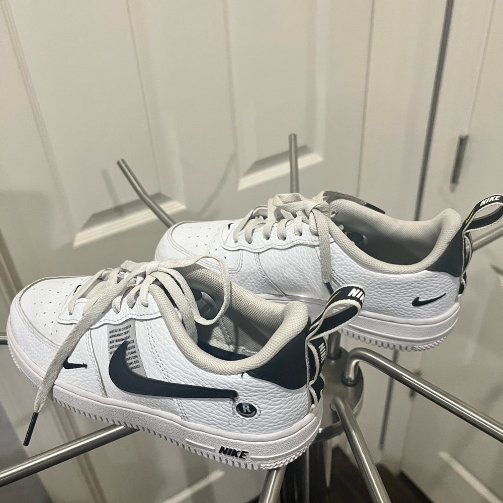 White  Nike's for children Size 2Y pre owned, barely used